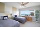 Bright bedroom with ocean views from the window between two twin beds at 1621 Gulf Blvd # 1604, Clearwater Beach, FL 33767