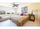 Relaxing bedroom with large windows, city views, and plush bedding at 1621 Gulf Blvd # 1604, Clearwater Beach, FL 33767