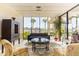 Comfortable sitting area with plush seating, a coffee table, and a peaceful view at 1621 Gulf Blvd # 1604, Clearwater Beach, FL 33767