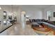 Living room featuring an open floor plan and adjacent dining area at 16516 Bridgewalk Dr, Lithia, FL 33547