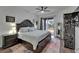 Spacious main bedroom with ceiling fan, and sliding glass door to the yard at 16516 Bridgewalk Dr, Lithia, FL 33547