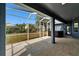 Spacious screened-in patio with a hot tub, ideal for outdoor relaxation and entertainment at 16516 Bridgewalk Dr, Lithia, FL 33547