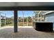 View of backyard and patio featuring hot tub and screened-in enclosure at 16516 Bridgewalk Dr, Lithia, FL 33547