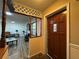 Foyer view of home shows the front door, entry way and living room area at 1703 N Taylor Rd, Brandon, FL 33510