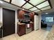 Modern kitchen featuring granite countertops, stainless steel appliances, and ample cabinet space at 1703 N Taylor Rd, Brandon, FL 33510