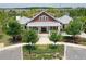 Charming clubhouse with well-manicured landscaping, offering a welcoming space for community gatherings at 18659 Noble Caspian Dr, Lutz, FL 33558