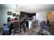 Inviting living area with seamless transition into the kitchen and dining space at 19047 Alfaro Loop, Spring Hill, FL 34610