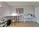 Bright craft room with neutral paint and ample workspace for creative projects like sewing at 1910 Elk Spring Dr, Brandon, FL 33511