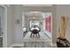 Bright dining room with modern chandelier, and view to the backyard pool at 1910 Elk Spring Dr, Brandon, FL 33511