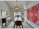 Light and airy dining room with stylish decor and a view of the pool at 1910 Elk Spring Dr, Brandon, FL 33511