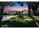 Charming single story home with a manicured lawn and mature trees enhancing the curb appeal at 1910 Elk Spring Dr, Brandon, FL 33511