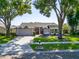 Beautiful single-story home with a well-maintained lawn and mature trees in a desirable neighborhood at 1910 Elk Spring Dr, Brandon, FL 33511