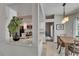 Open-concept kitchen with granite counters offers seamless flow to the adjacent dining area at 1910 Elk Spring Dr, Brandon, FL 33511