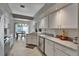 Bright and modern kitchen featuring granite countertops and stainless steel appliances at 1910 Elk Spring Dr, Brandon, FL 33511