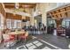 Clubhouse interior featuring an open floor plan, high ceilings, bar and comfortable seating at 19837 Lonesome Pine Dr, Land O Lakes, FL 34638