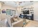 Inviting living room featuring tile floors and a view of the pool at 19837 Lonesome Pine Dr, Land O Lakes, FL 34638