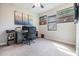 Home office space with carpeted floors, natural light, and a dedicated work area at 19837 Lonesome Pine Dr, Land O Lakes, FL 34638