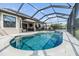 Screened pool and patio with an outdoor living space at 19837 Lonesome Pine Dr, Land O Lakes, FL 34638