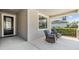 Cozy porch with seating area at 19837 Lonesome Pine Dr, Land O Lakes, FL 34638