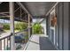 Condo balcony featuring black iron railings, and gray painted siding at 200 Country Club Dr # 906, Largo, FL 33771