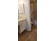 This bathroom features a single sink vanity, tile flooring, and a shower/tub at 200 Country Club Dr # 906, Largo, FL 33771