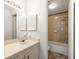 This bathroom features a single sink vanity, tile flooring, and a shower/tub at 200 Country Club Dr # 906, Largo, FL 33771