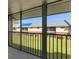 Relax on this screened patio with community views at 200 Country Club Dr # 906, Largo, FL 33771