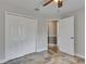 Spacious bedroom with closet and an open doorway to another room at 2010 Rutherford Dr, Dover, FL 33527