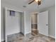 Spacious bedroom with closet and an open doorway to another room at 2010 Rutherford Dr, Dover, FL 33527