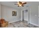 Bedroom with closet, ceiling fan, and colorful art adds vibrancy to the living space at 2010 Rutherford Dr, Dover, FL 33527