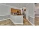 Kitchen featuring stainless steel appliances, wooden cabinets, and spacious countertop area at 2010 Rutherford Dr, Dover, FL 33527