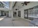 The large lanai features a seamless flow to the pool and kitchen through multiple sliding doors at 2010 Rutherford Dr, Dover, FL 33527
