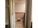 En-suite bathroom features a tiled floor, vanity and toilet, providing convenience and privacy at 2101 Sunset Point Rd # 2305, Clearwater, FL 33765