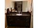 Bathroom vanity with a decorative backsplash and large mirror enhance this space at 2101 Sunset Point Rd # 2305, Clearwater, FL 33765