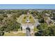 Aerial view highlighting the community entrance with landscaping at 2221 Swedish Dr # 55, Clearwater, FL 33763