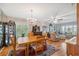 Open-concept dining room with wood floors, chandelier, and connection to the living area for gatherings at 2221 Swedish Dr # 55, Clearwater, FL 33763