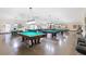 Spacious game room features multiple pool tables, perfect for entertainment and leisure at 2221 Swedish Dr # 55, Clearwater, FL 33763