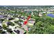 Wonderful birds eye view of a neighborhood that is close to a scenic lake and lots of mature trees at 2405 Dakota Rock Dr, Ruskin, FL 33570