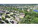 Wonderful birds eye view of a neighborhood that is close to a scenic lake and lots of mature trees at 2405 Dakota Rock Dr, Ruskin, FL 33570