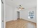 This bedroom offers a window with bright natural light, as well as a walk-in closet at 2405 Dakota Rock Dr, Ruskin, FL 33570