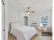 Relaxing bedroom featuring neutral colors, comfortable furniture, and natural light at 2405 Dakota Rock Dr, Ruskin, FL 33570