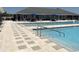 Community pool featuring a zero depth entrance and a large sun deck with lounge seating at 2405 Dakota Rock Dr, Ruskin, FL 33570
