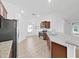 Kitchen featuring stainless steel appliances, granite countertops, and wooden cabinets at 2405 Dakota Rock Dr, Ruskin, FL 33570