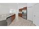 Kitchen featuring stainless steel appliances, granite countertops, and wooden cabinets at 2405 Dakota Rock Dr, Ruskin, FL 33570