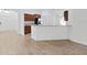 Open concept kitchen with stainless steel appliances and bright lighting at 2405 Dakota Rock Dr, Ruskin, FL 33570