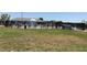 Community splash pad with overhead sprinklers, surrounded by an ornate fence and landscaping at 2405 Dakota Rock Dr, Ruskin, FL 33570