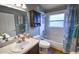 Well-maintained bathroom with a shower-tub combo and vanity with sink, offering essential amenities at 2604 Clareside Dr, Valrico, FL 33596