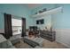 Stylish bedroom with a lofted shelf, offering a comfortable and functional living space for relaxation at 2604 Clareside Dr, Valrico, FL 33596