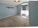 Bright bedroom with natural light and a decorative shelf, offering a versatile space for relaxation and personalization at 2604 Clareside Dr, Valrico, FL 33596