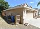 Home exterior with attached garage and yard at 2604 Clareside Dr, Valrico, FL 33596